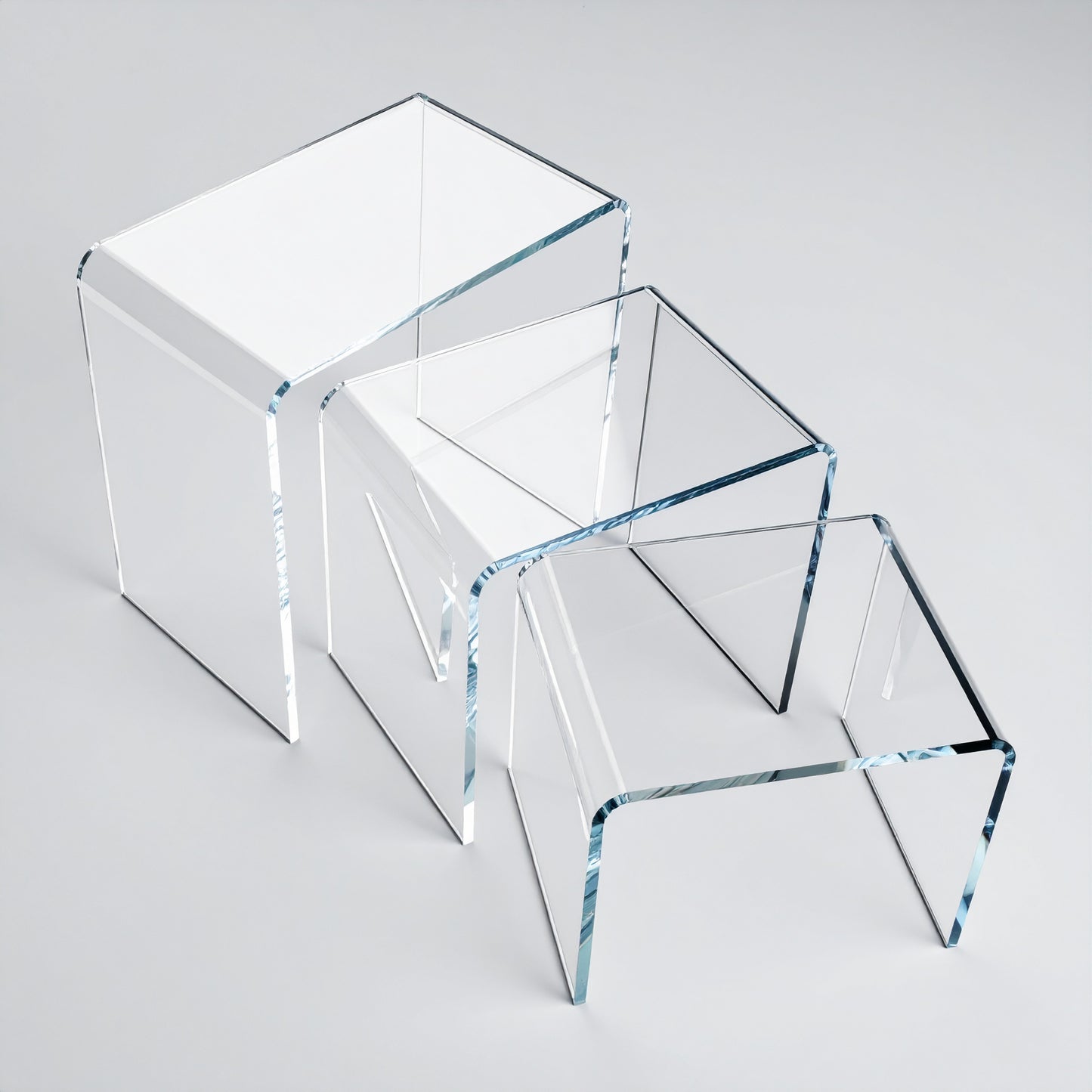 Acrylic Display Riser Set — Clear Tiered Stands – clear acrylic display stand for retail, showroom, or countertop use, size 2x2x2, 3x3x3, 4x4x4. Made in the USA by WebAcrylics.