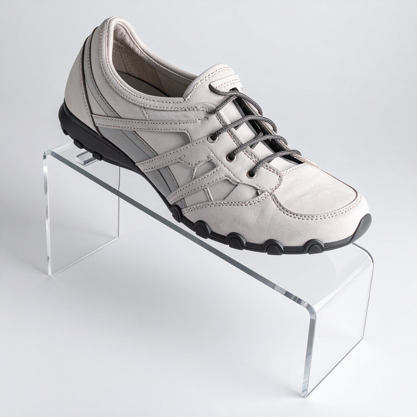Slant-Style Shoe Riser — Clear Acrylic – clear acrylic display stand for retail, showroom, or countertop use, size 4 x 5. Made in the USA by WebAcrylics.