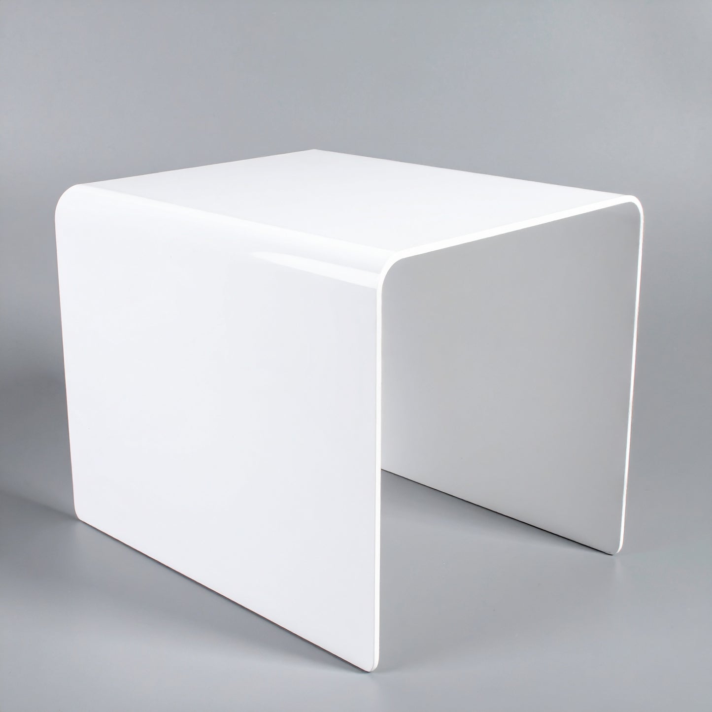 White Acrylic Display Riser — 1/8" Thick – clear acrylic display stand for retail, showroom, or countertop use, size 2 x 2 x 2. Made in the USA by WebAcrylics.
