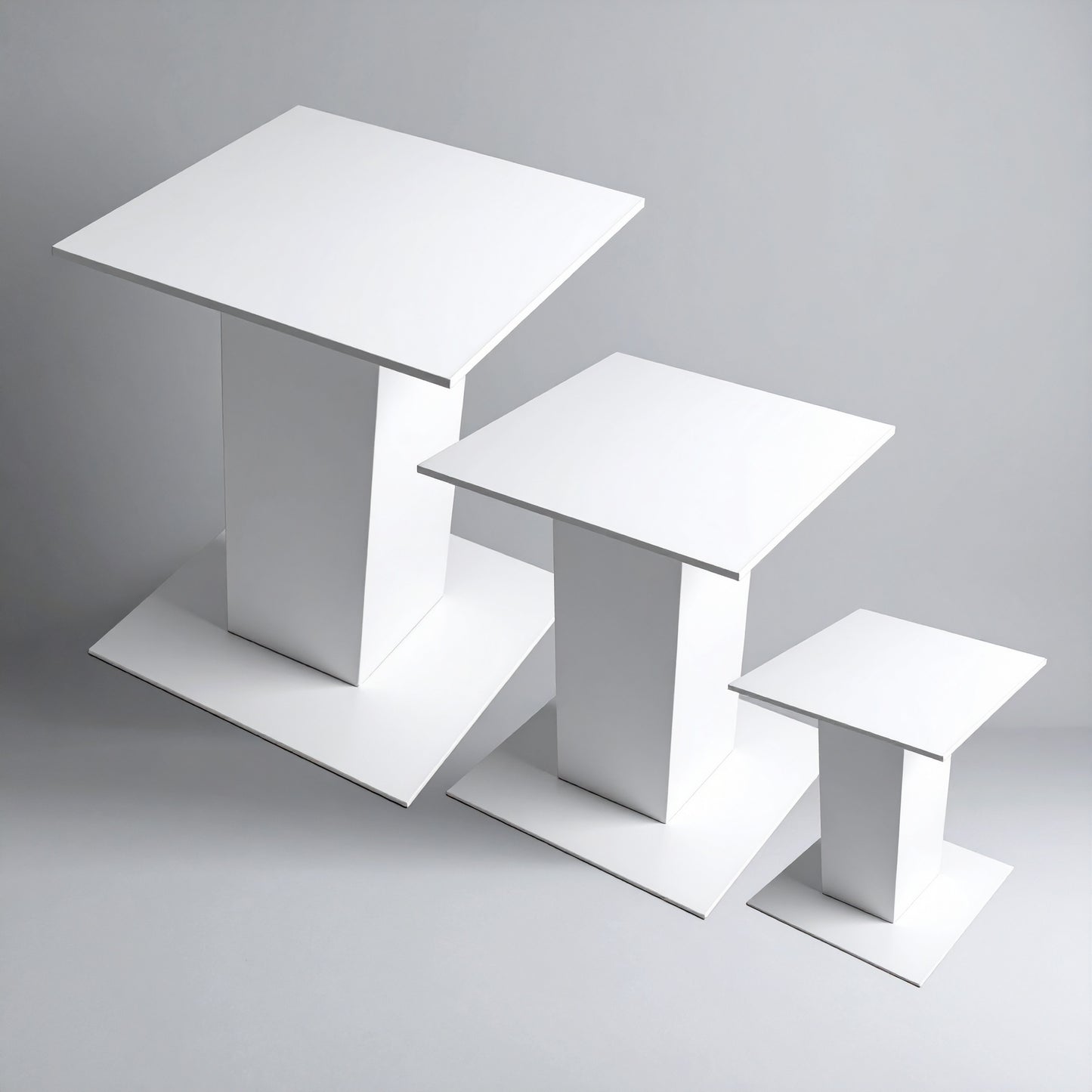 White Acrylic Pedestal Set — Tiered Display Collection – clear acrylic display stand for retail, showroom, or countertop use, size 3x3x4, 3x3x5, 3x3x6. Made in the USA by WebAcrylics.