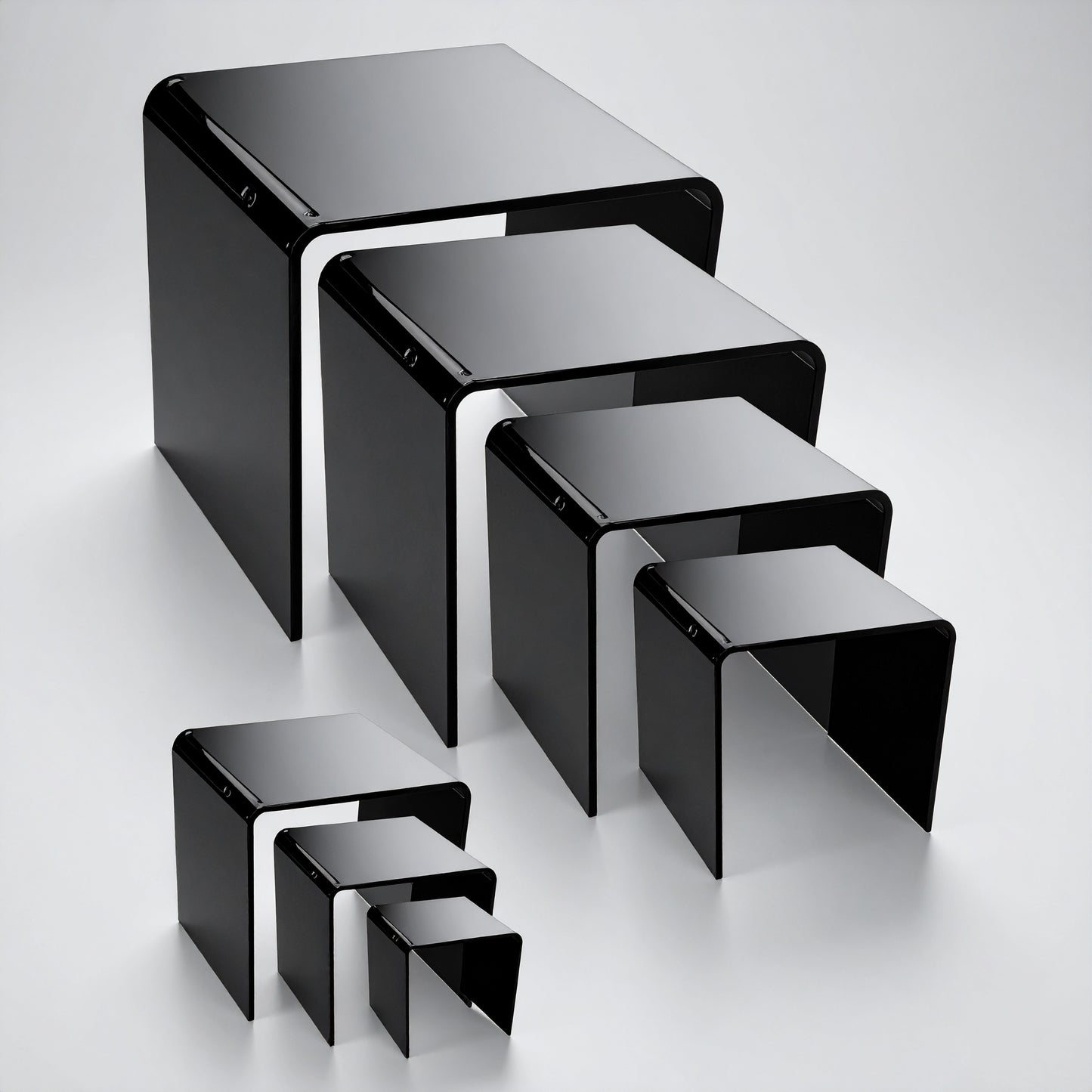 Black Acrylic Display Riser Set — Opaque Tiered Stands – clear acrylic display stand for retail, showroom, or countertop use, size 2x2x2, 3x3x3, 4x4x4. Made in the USA by WebAcrylics.