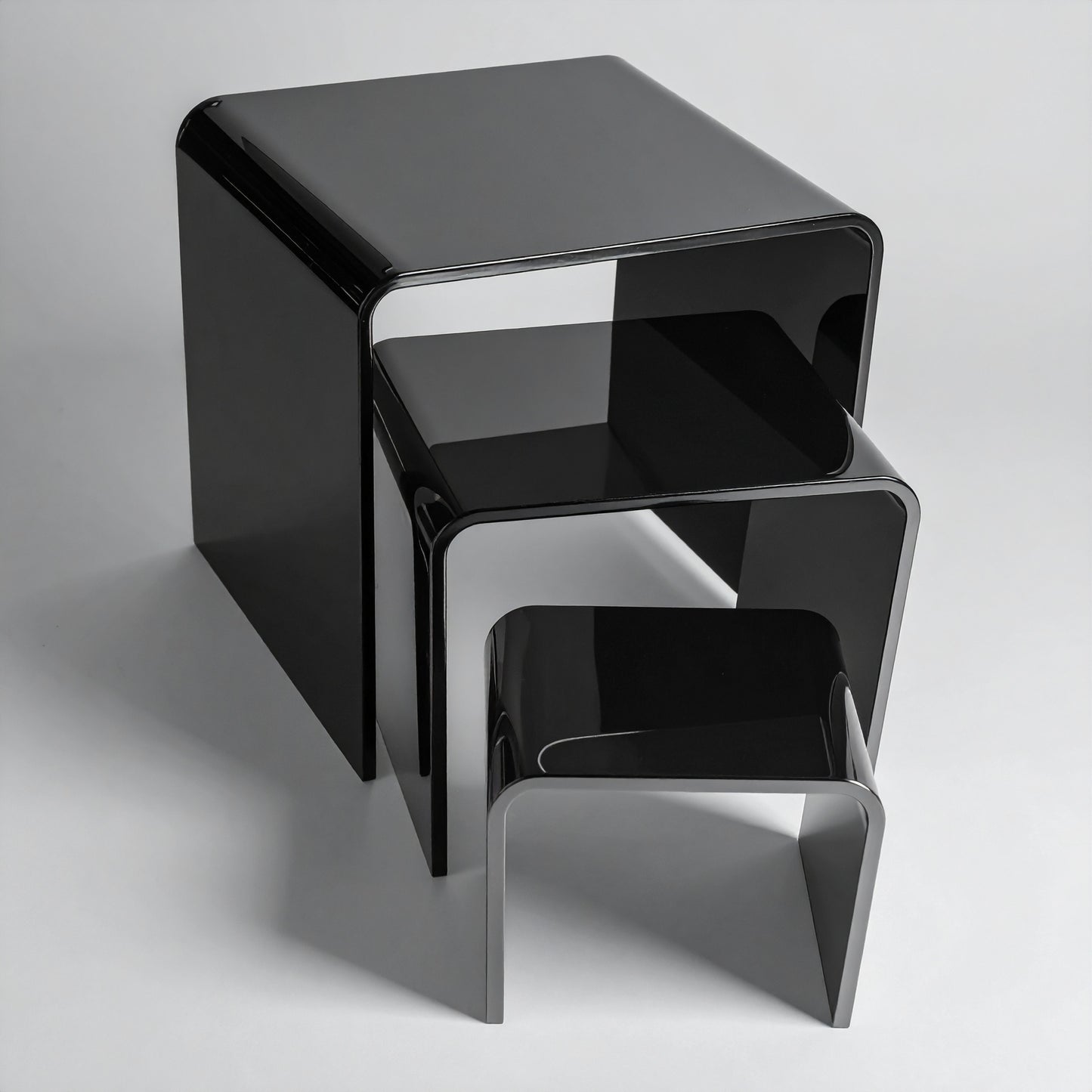 Black Acrylic Display Riser Set — Opaque Tiered Stands – clear acrylic display stand for retail, showroom, or countertop use, size 2x2x2, 3x3x3, 4x4x4. Made in the USA by WebAcrylics.