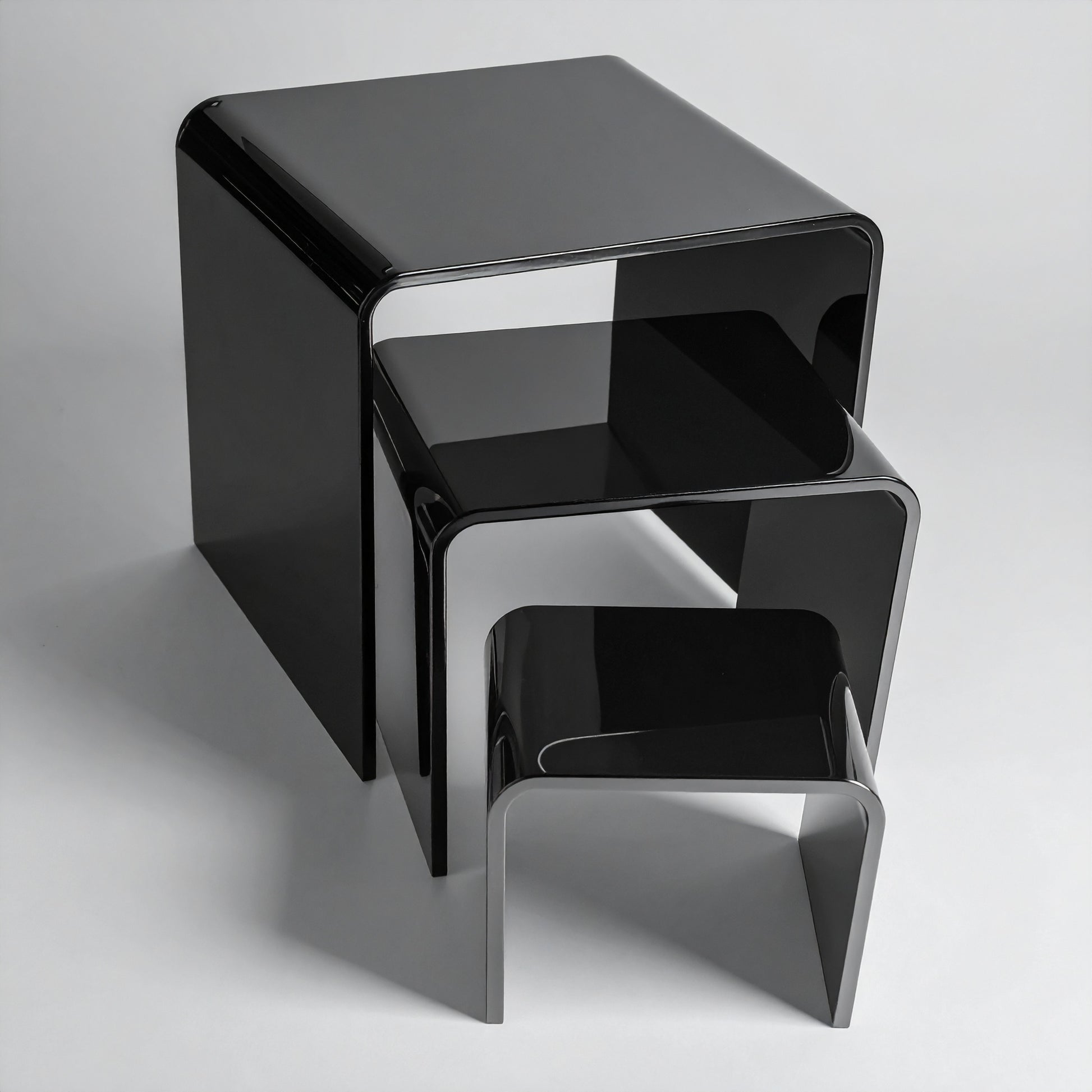 Black Acrylic Display Riser Set — Opaque Tiered Stands – clear acrylic display stand for retail, showroom, or countertop use, size 2x2x2, 3x3x3, 4x4x4. Made in the USA by WebAcrylics.