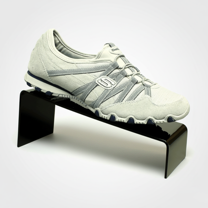 Black Slant-Style Shoe Riser — Acrylic Footwear Display – clear acrylic display stand for retail, showroom, or countertop use, size 4 x 5. Made in the USA by WebAcrylics.