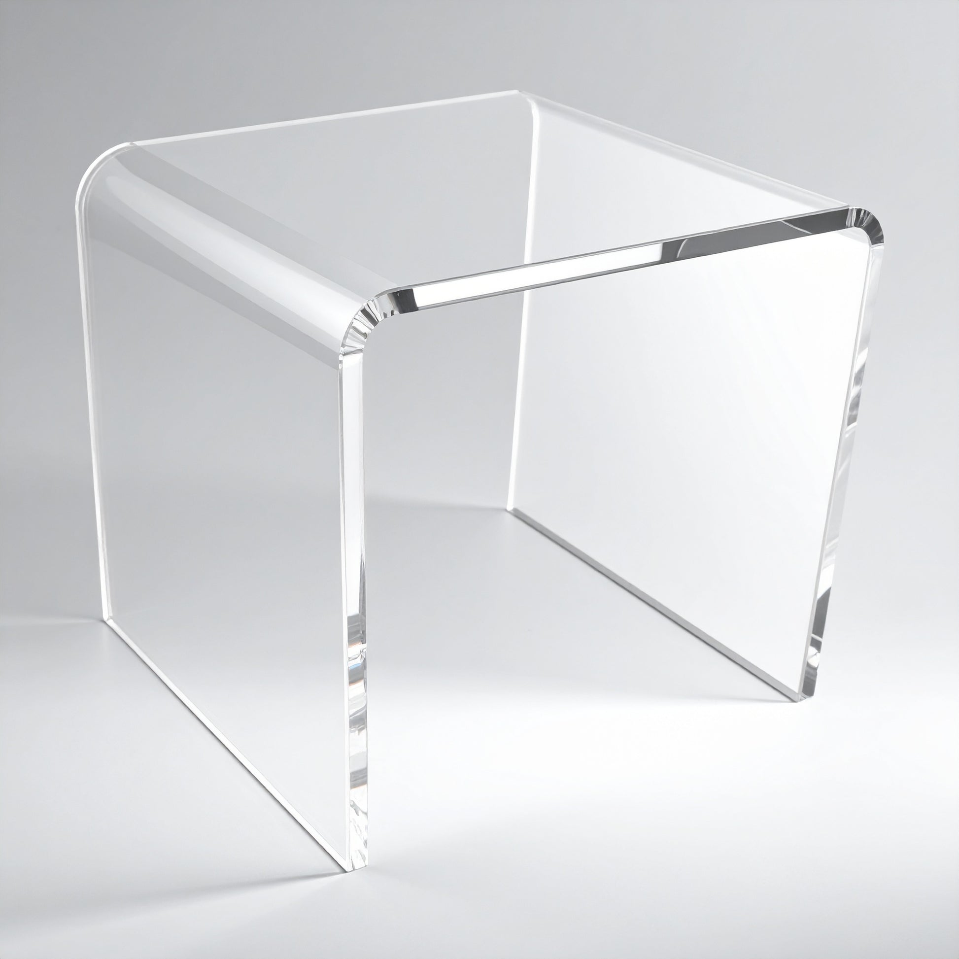 Clear Acrylic Display Riser — 3/16" Thick – clear acrylic display stand for retail, showroom, or countertop use, size 4 x 4 x 4. Made in the USA by WebAcrylics.