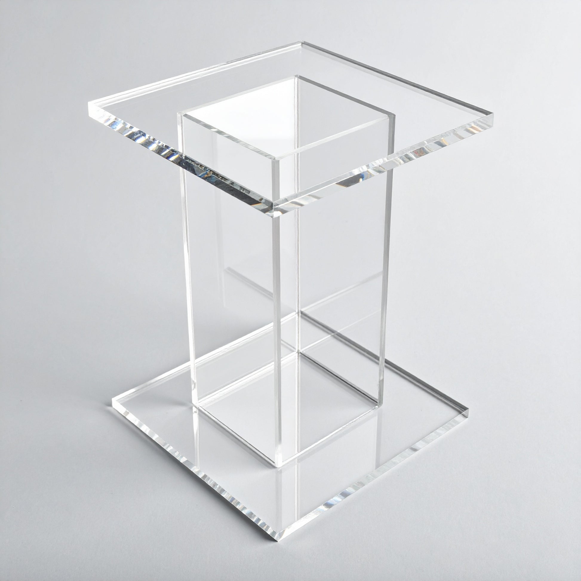 Clear Acrylic Pedestal Display Riser — Square Tabletop – clear acrylic display stand for retail, showroom, or countertop use, size 4 x 4 x 4. Made in the USA by WebAcrylics.