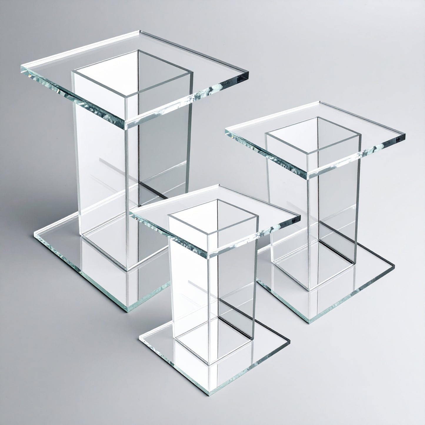 Clear Acrylic Pedestal Set — Tiered Display Stands – clear acrylic display stand for retail, showroom, or countertop use, size 3x3x4, 3x3x5, 3x3x6. Made in the USA by WebAcrylics.