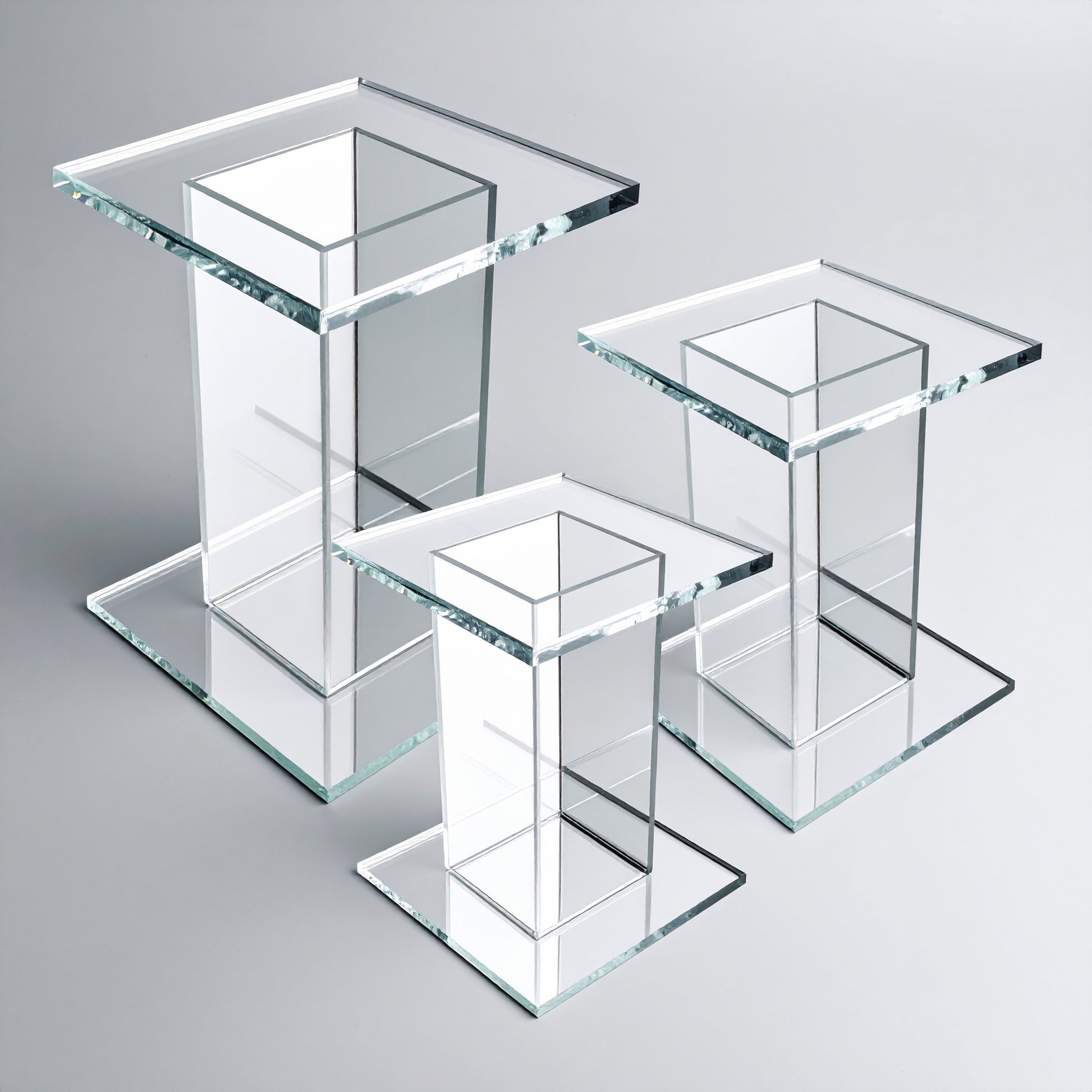 Clear Acrylic Pedestal Set — Tiered Display Stands – clear acrylic display stand for retail, showroom, or countertop use, size 3x3x4, 3x3x5, 3x3x6. Made in the USA by WebAcrylics.