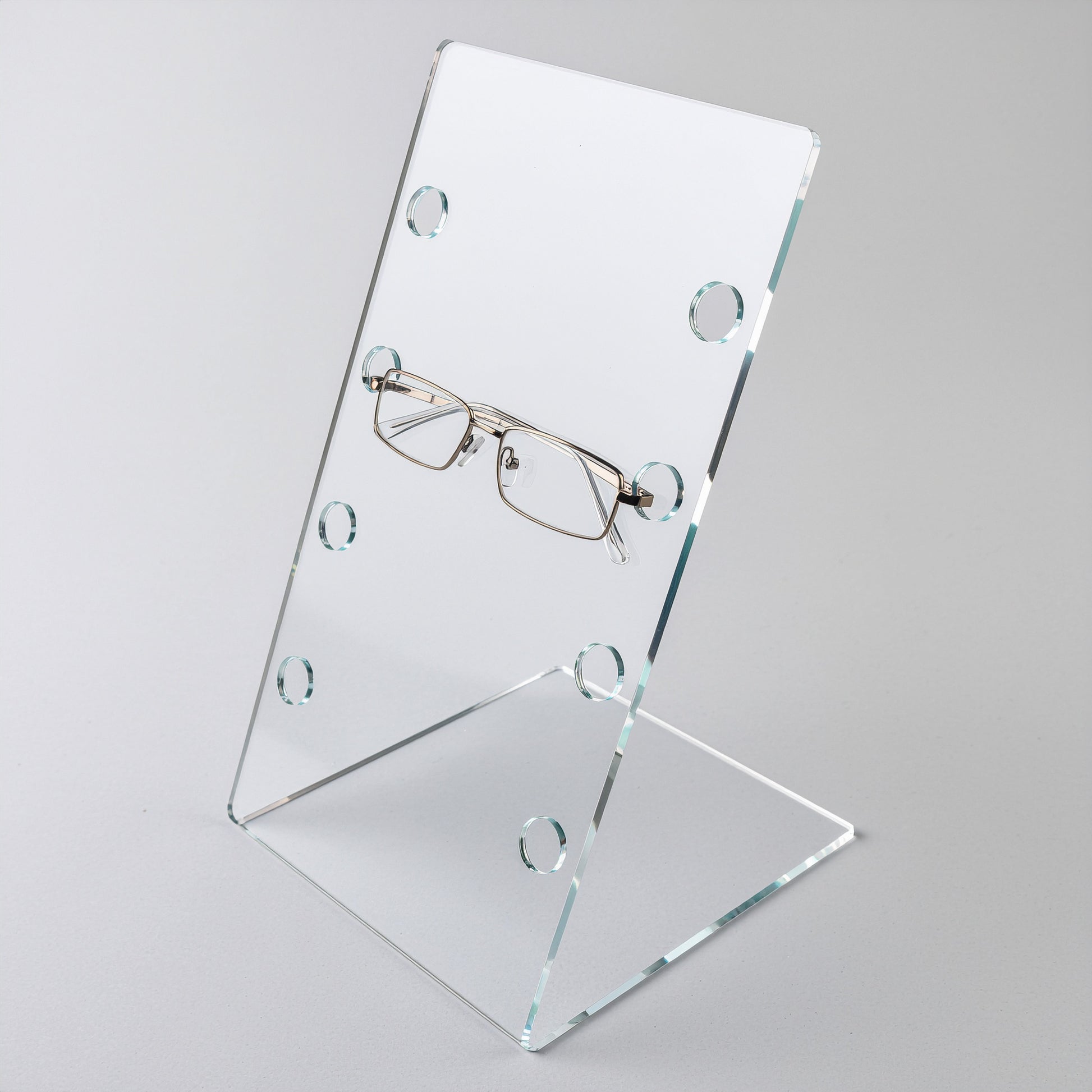Eyeglass Display Holder — Slanted Stand — Clear Acrylic – clear acrylic display stand for retail, showroom, or countertop use, size 4 Pairs. Made in the USA by WebAcrylics.