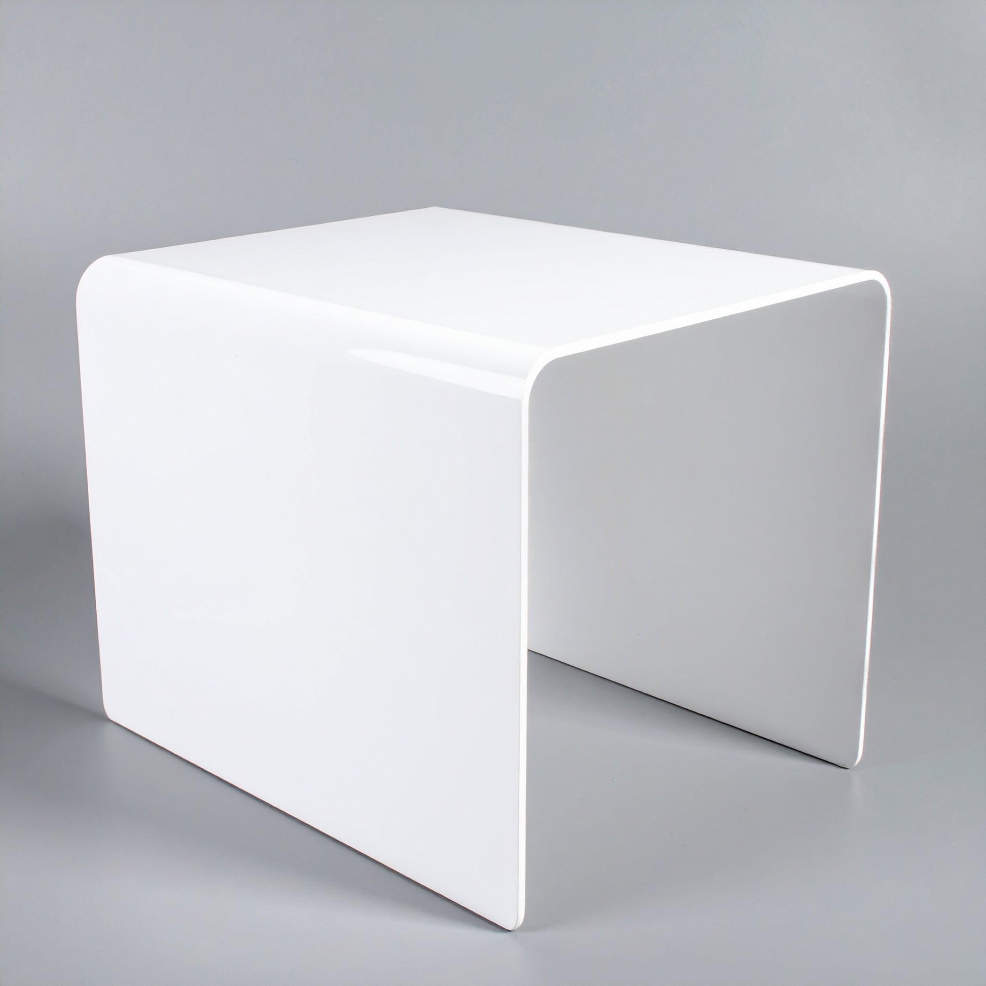White Acrylic Display Riser — 1/8" Thick – clear acrylic display stand for retail, showroom, or countertop use, size 2 x 2 x 2. Made in the USA by WebAcrylics.