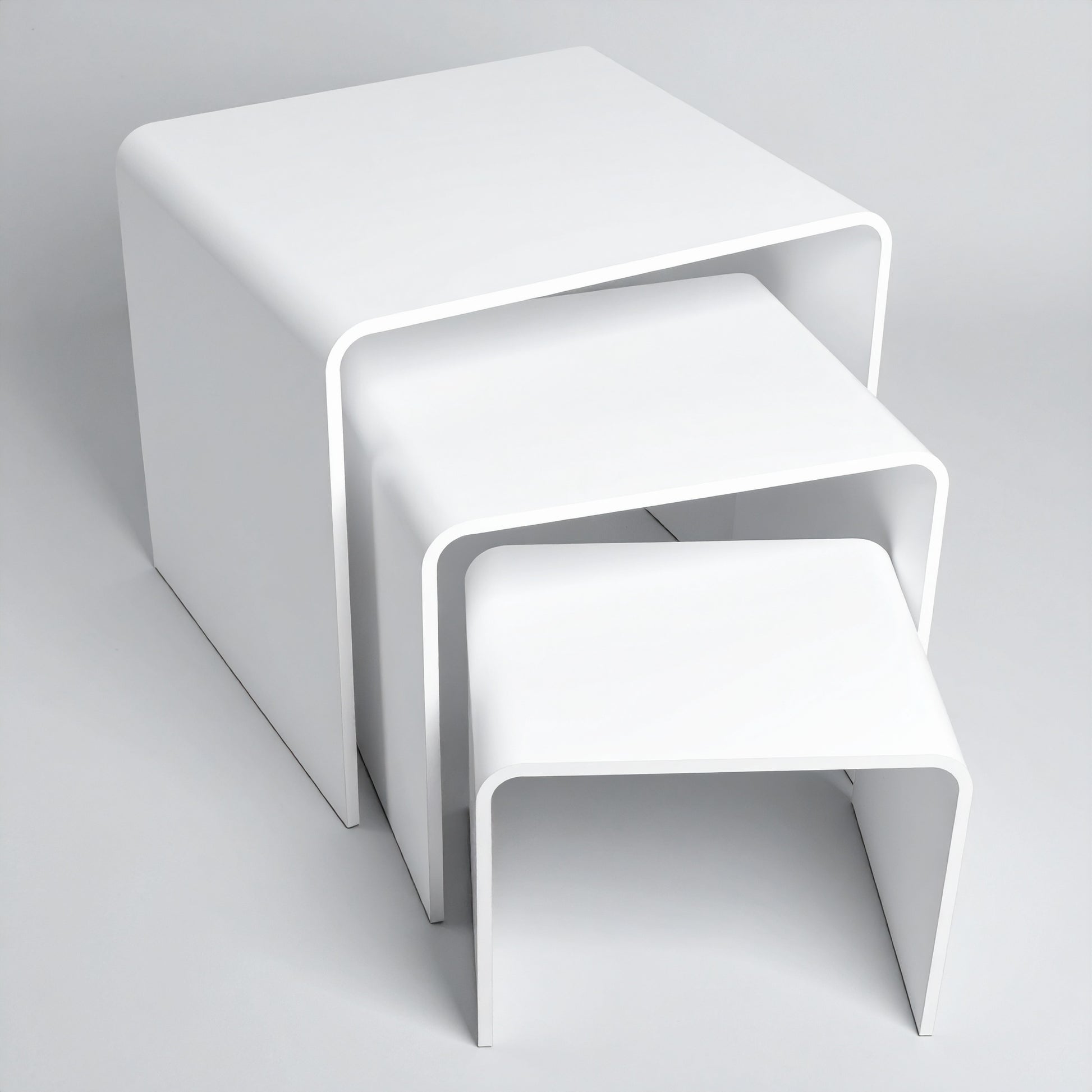 White Acrylic Display Riser Set — Opaque Tiered Stands – clear acrylic display stand for retail, showroom, or countertop use, size 2x2x2, 3x3x3, 4x4x4. Made in the USA by WebAcrylics.