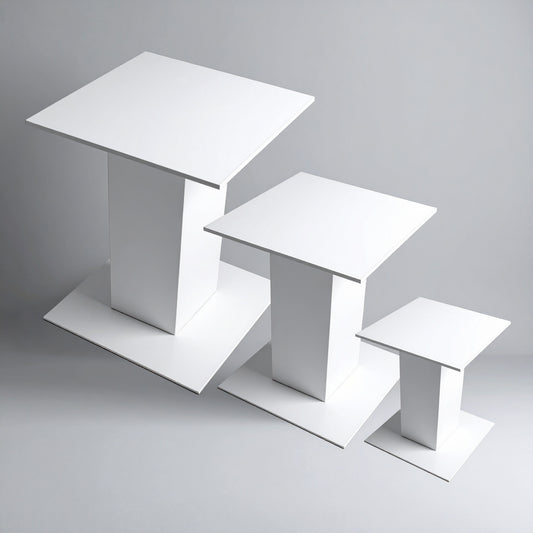 White Acrylic Pedestal Set — Tiered Display Collection – clear acrylic display stand for retail, showroom, or countertop use, size 3x3x4, 3x3x5, 3x3x6. Made in the USA by WebAcrylics.