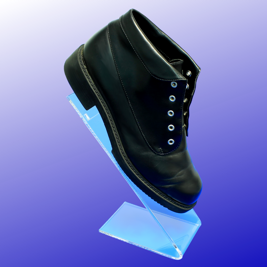Acrylic shoe display with a slant back angle for display shoes