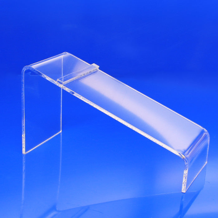 Clear shoe display riser with a slanted viewing angle